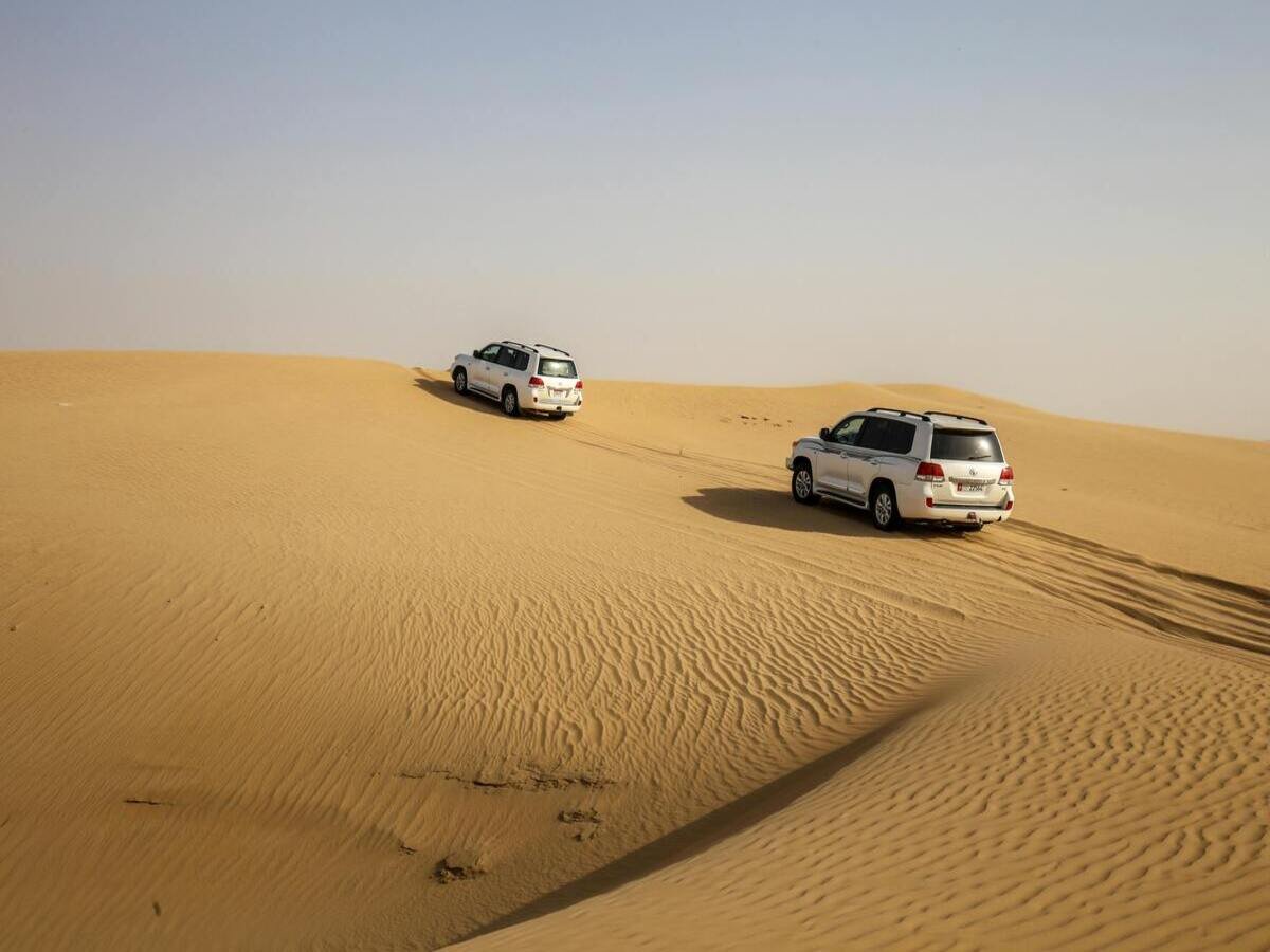 Desert expedition across sand dunes